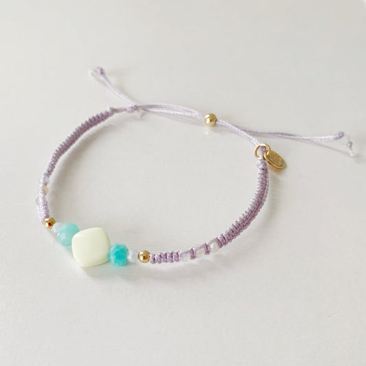 The coastal haze captiva macrame bracelets photographed on a white surface